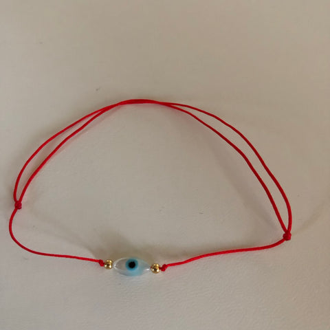 Mini oval evil eye red string bracelet